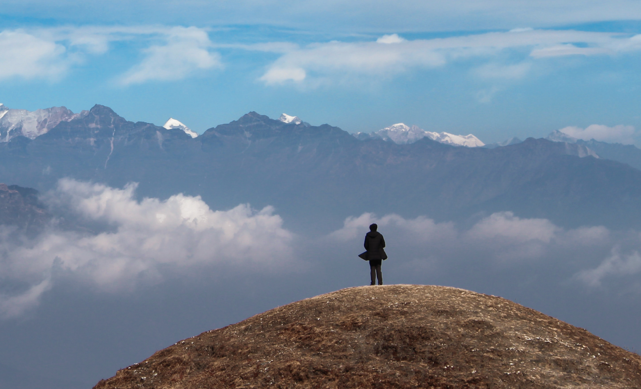 ManOverlookingMountains